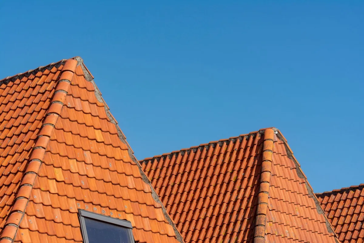 Clay barrel tile rooflines on homes in Modesto, CA